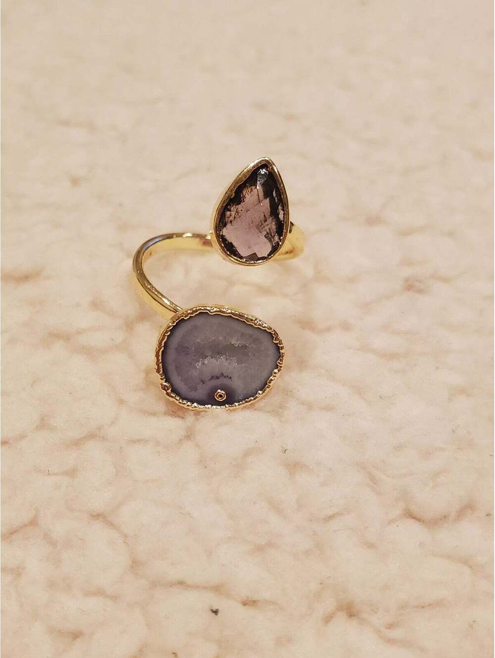 Purple amethyst and solar quartz ring